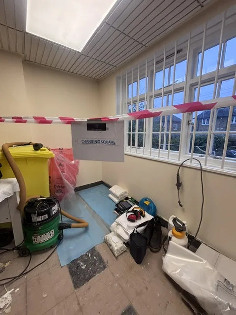 Asbestos floor tile and bitumen removal in Streatham